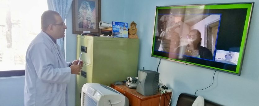 Prof. Dr. Anil Kumar Jha consulting patient via video link